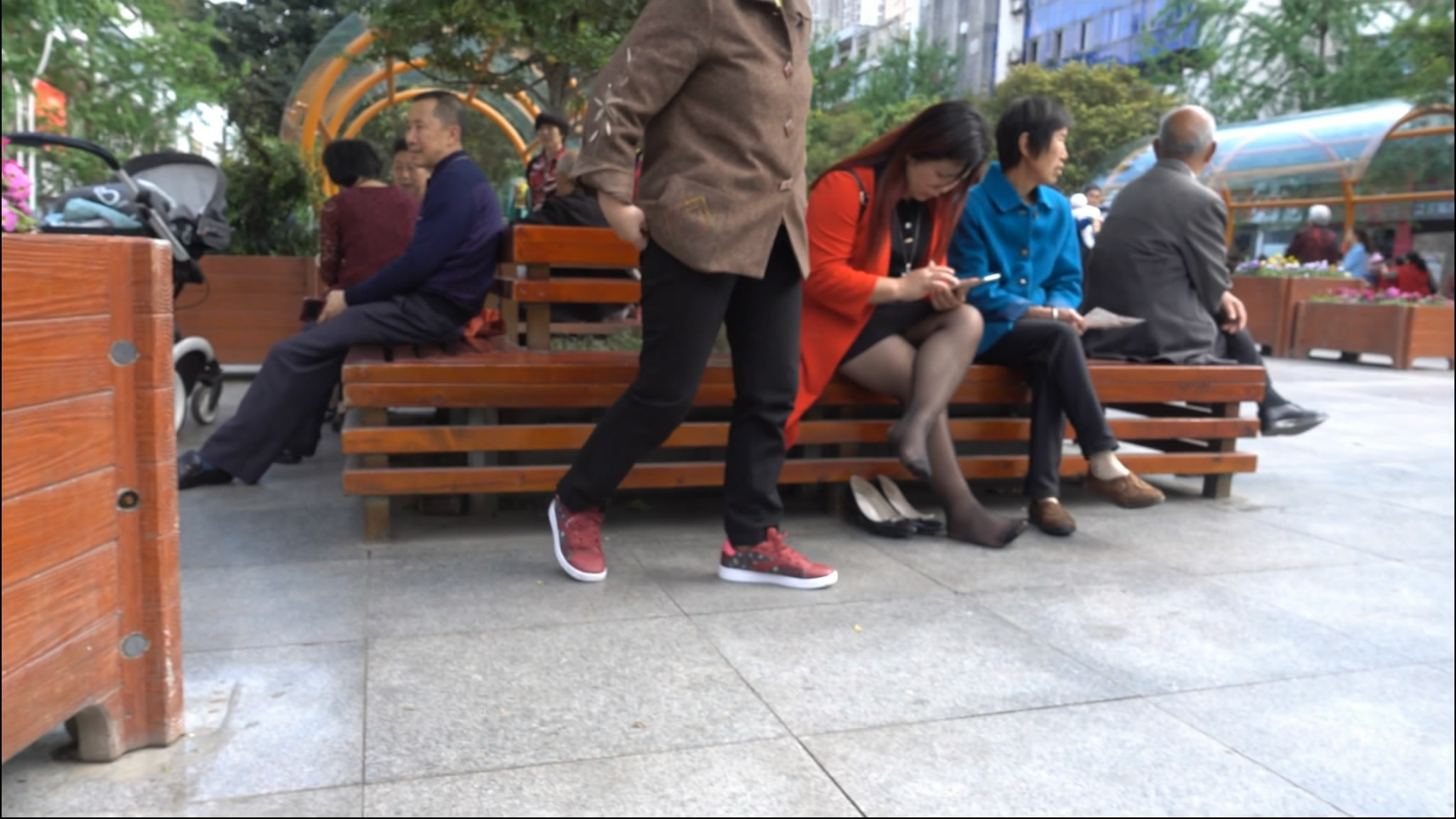 woman who is serious with her cellphone and mother
